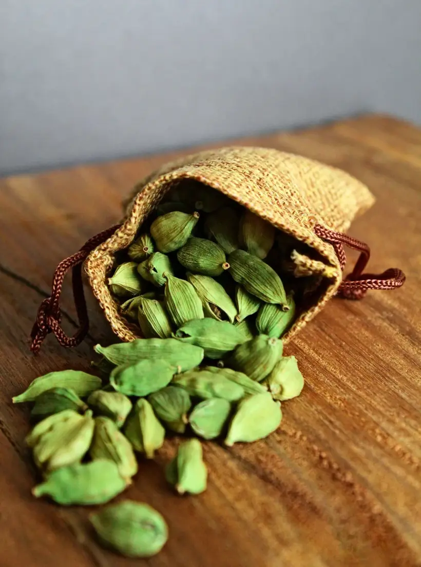 Whole green cardamom pods from the Western Ghats, graded and ready for packing