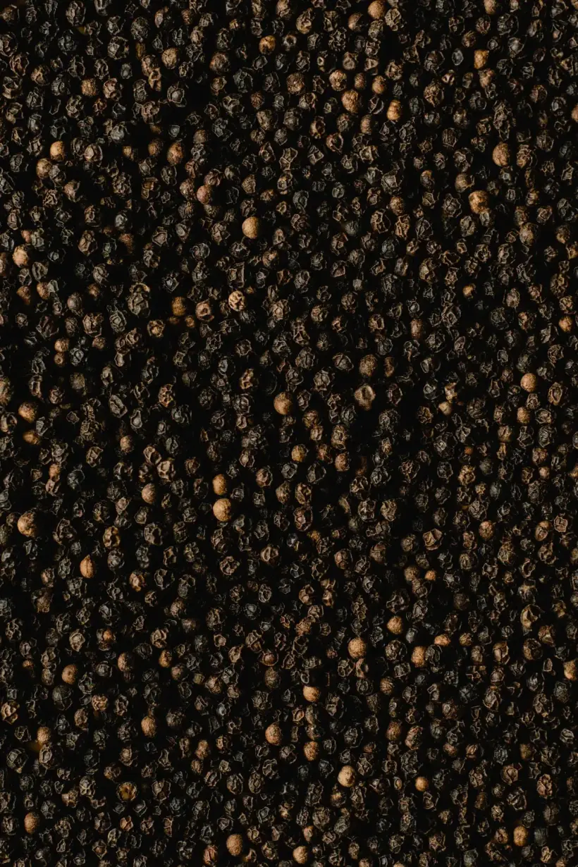 Bold Idukki black peppercorns, sun-dried and sorted